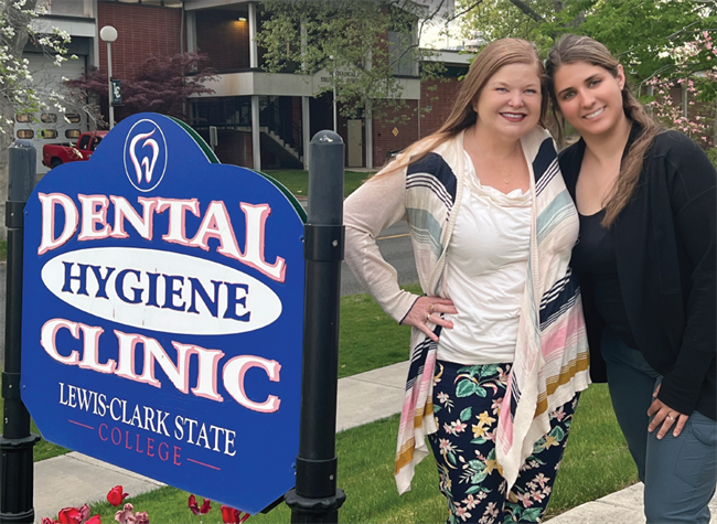 Robin Henderson, DDS and Catherine Tetrick, RDH stand outside the Lewis-Clark dental hygiene program facility.